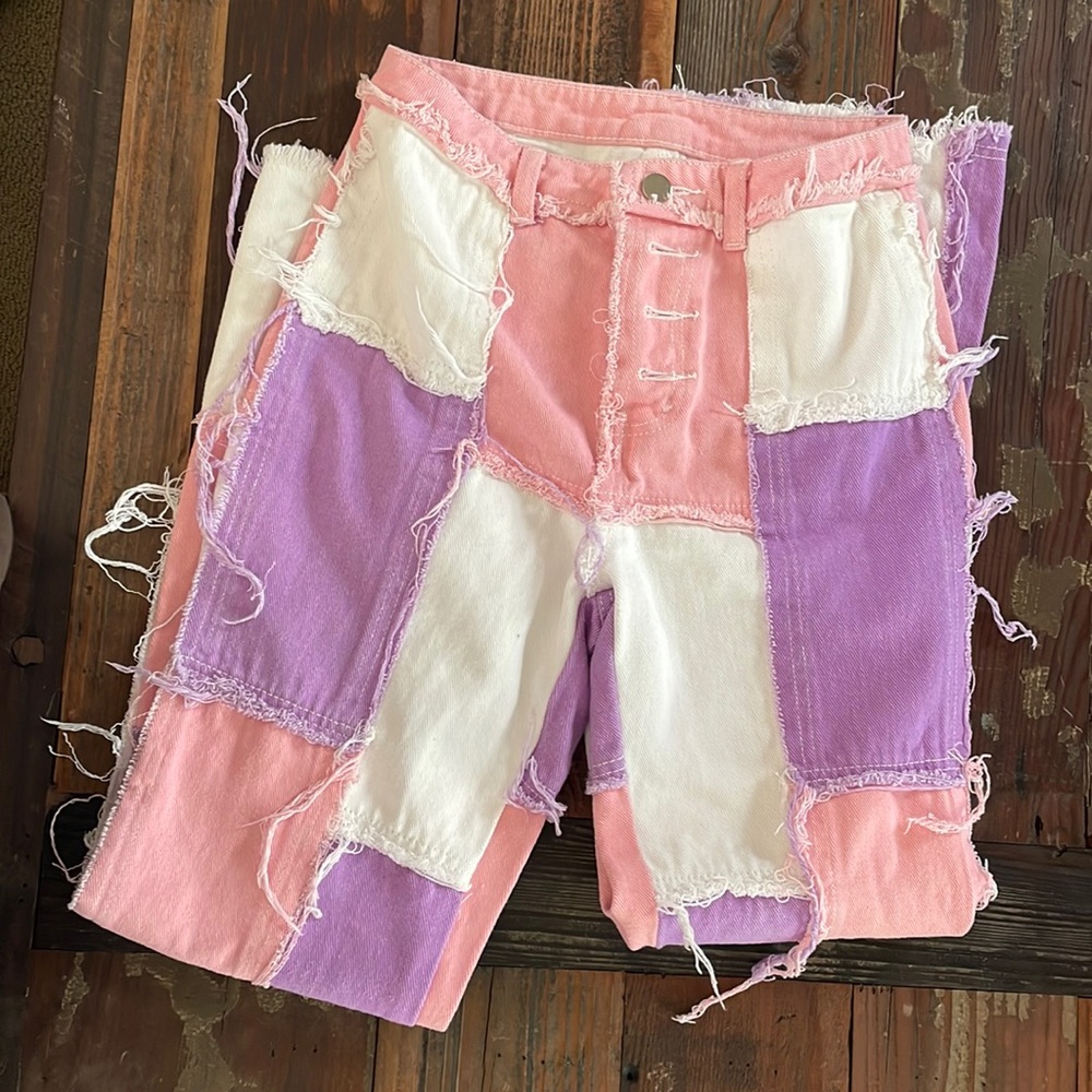 SHEIN pink, white, and purple patch jeans